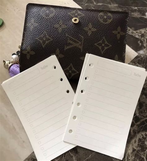 Products by Louis Vuitton: Pocket Agenda Refill 2025.